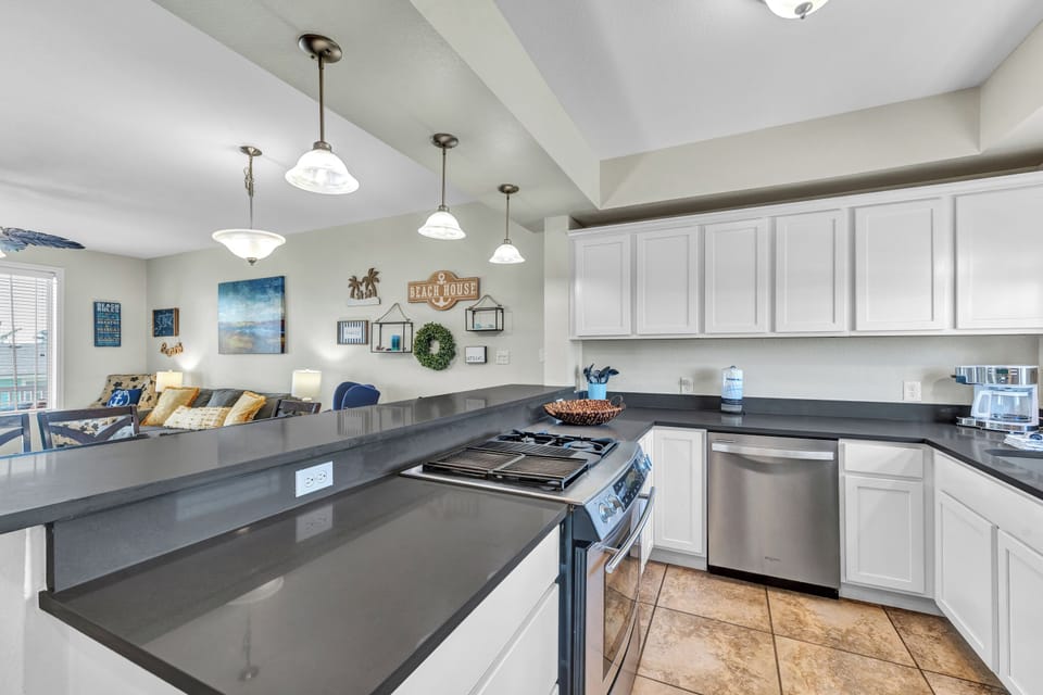 Your fully equipped kitchen features modern appliances and sleek granite countertops, perfect for preparing meals together.