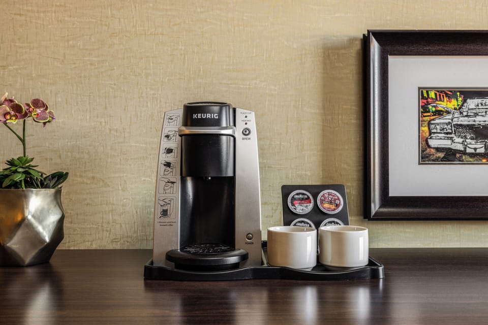 Junior Suite, 1 Bedroom | In-room safe, desk, iron/ironing board, free cribs/infant beds