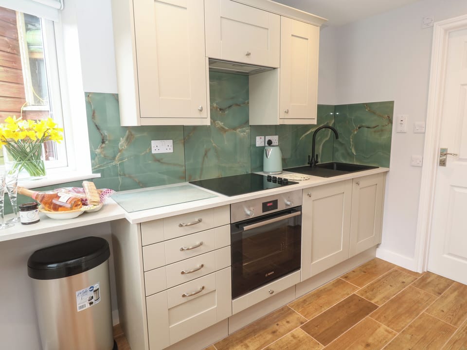 Fridge, microwave, cookware/dishes/utensils
