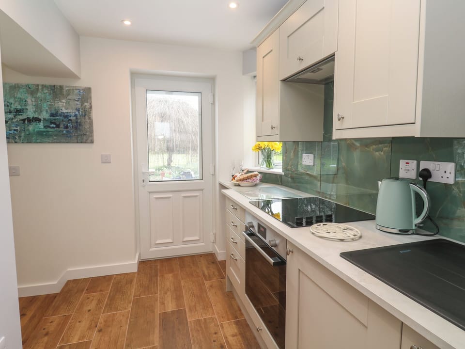 Fridge, microwave, cookware/dishes/utensils