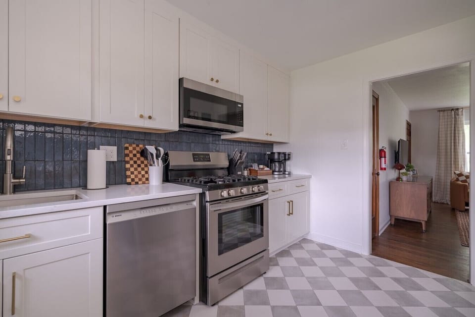 Our kitchen is fully stocked, including a dishwasher, microwave, and plenty of counterspace!