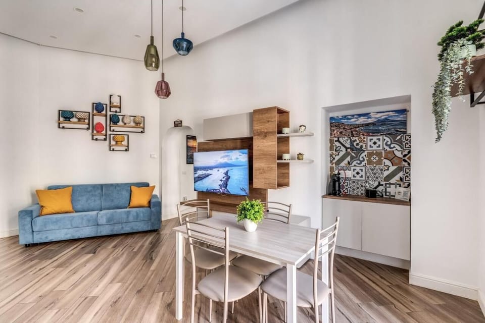 Deluxe Apartment, Balcony, City View | Living area | Flat-screen TV