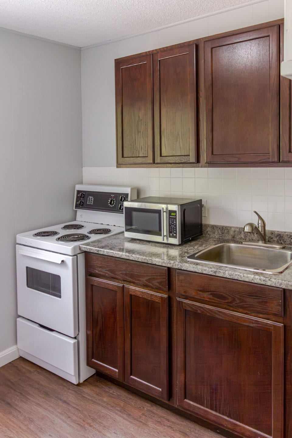 Kitchen equipped with the essentials for cooking, serving and storing food