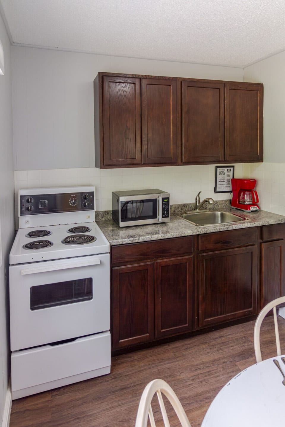 Kitchen equipped with the essentials for cooking, serving and storing food