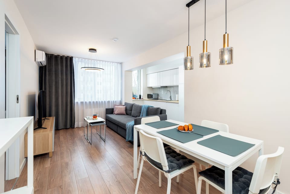 Comfort Apartment, Balcony, City View | Living area | 50-inch Smart TV with satellite channels, Netflix, streaming services