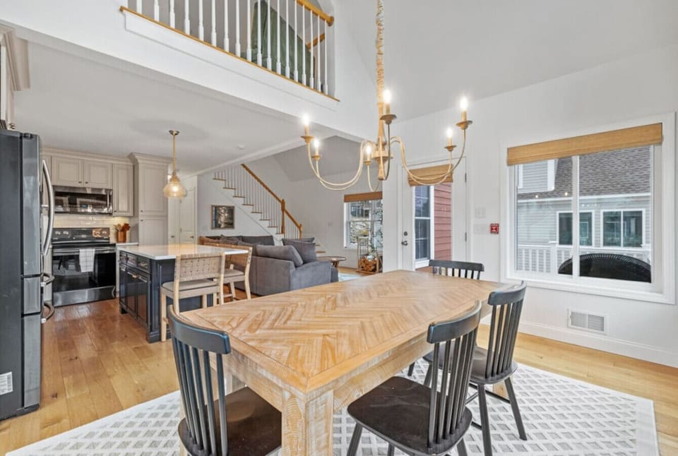 Beautiful open floor plan with cohesive flow between kitchen, dining, and living areas