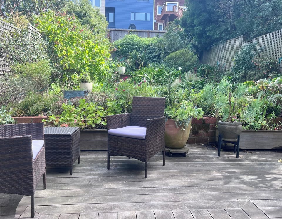 Outdoor patio with beautiful greenery