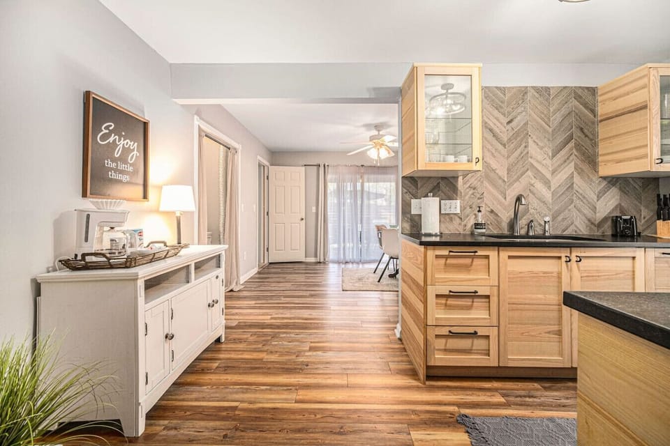 Kitchen with drip coffee maker, stove/oven, refrigerator, and microwave