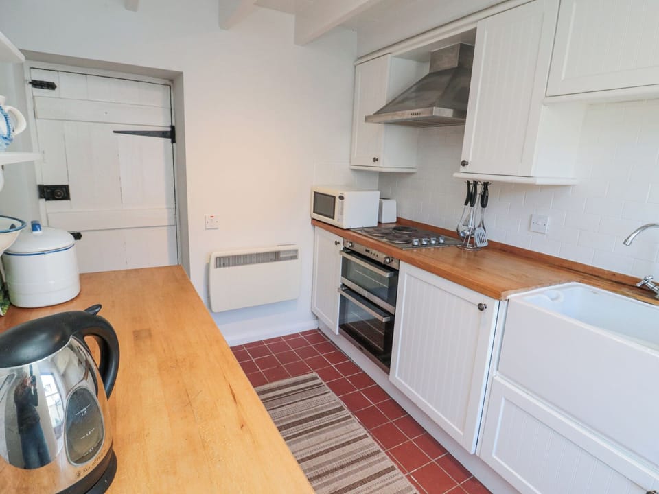 Fridge, dishwasher, toaster, cookware/dishes/utensils