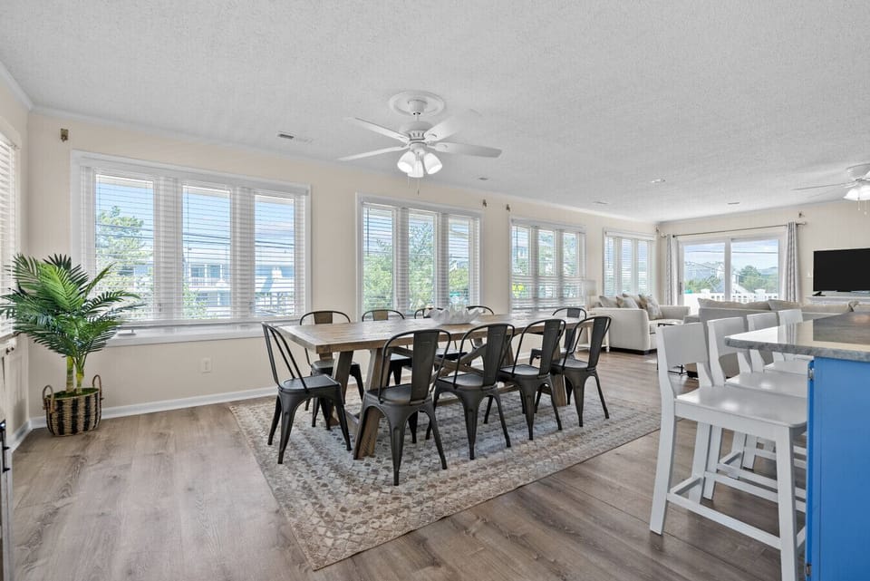 Bright and cozy dining area filled with natural light, ideal for morning coffee or evening meals.