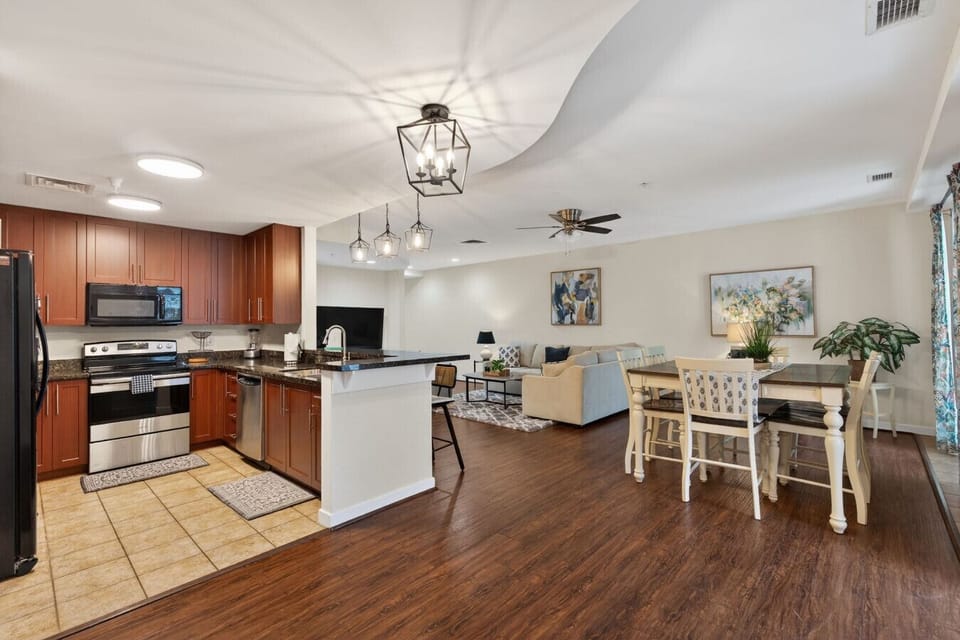 Perfect for group getaways with a full kitchen, dining table for shared meals, and a cozy living room to relax after the beach.