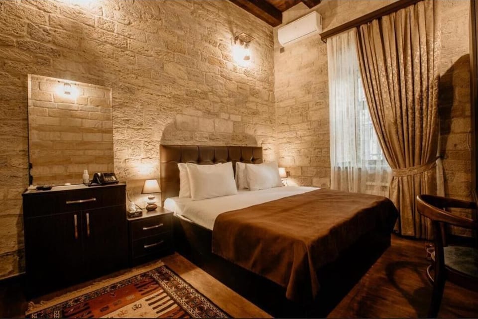 Economy Double Room | Egyptian cotton sheets, premium bedding, Select Comfort beds, minibar