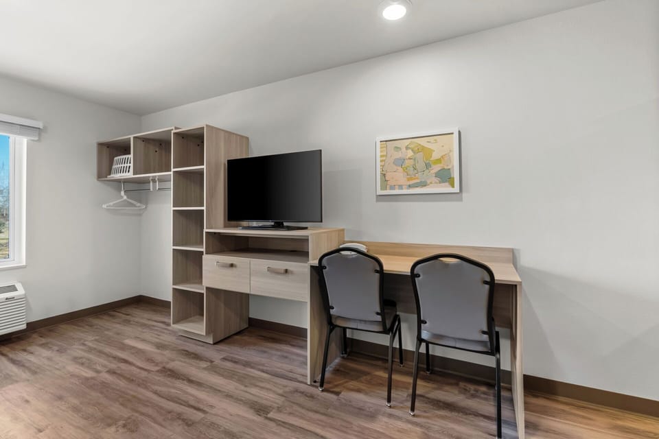 Suite, 1 King Bed, Non Smoking | Desk, laptop workspace, blackout drapes, free WiFi