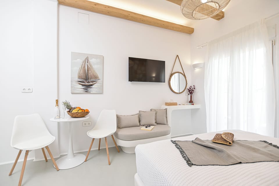 Junior Suite, Balcony, Sea View | 1 bedroom, in-room safe, laptop workspace, soundproofing