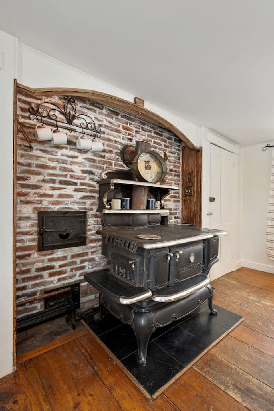 Antique stove that tells stories of warmth and comfort.