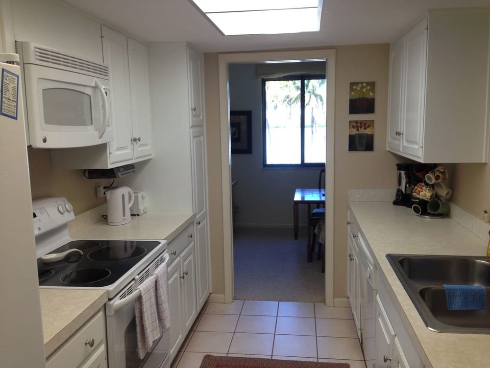 Updated kitchen with all appliances, dishes, cutlery, pots, pans, etc.