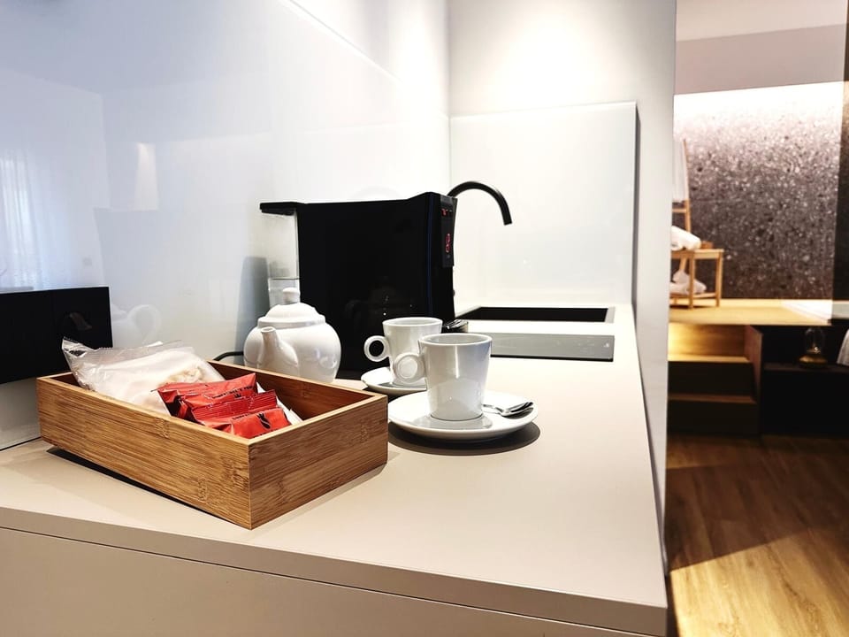 Superior Triple Room, Balcony, Courtyard View | Private kitchen | Mini-fridge, stovetop