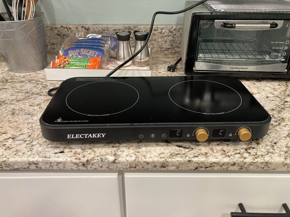 Two "burner" induction cooktop. Use only with induction compatible cookware.