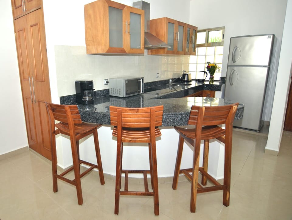 Apartment, 2 Bedrooms, Balcony, City View | Private kitchen | Fridge, microwave, cookware/dishes/utensils