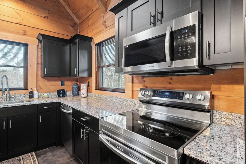 Breakfast Ready: stainless steel electric stove and microwave. 