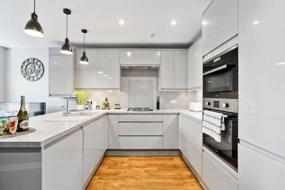 Sleek, fully equipped kitchen with a bright, neutral finish. Fitted with oven, hob, fridge-freezer, microwave, kettle, toaster, dishwasher, plus everything needed for simple, comfortable self-catering.