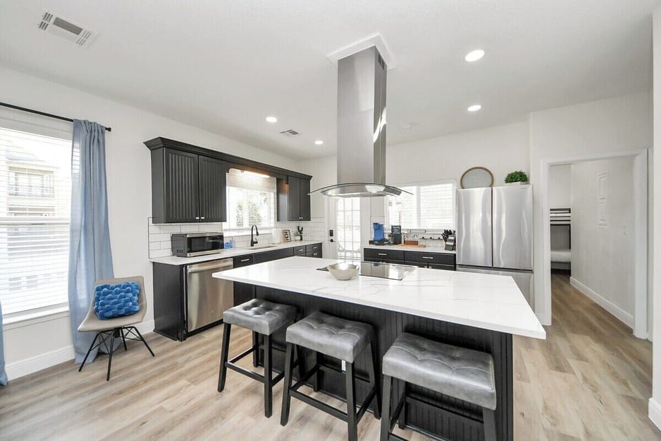 Prepping meals or hosting friends  is a breeze in this kitchen! Make delicious memories in a space that is both functional & fun. 