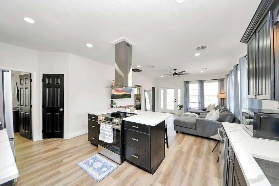 The newly remodeled kitchen comes with everything needed for whipping up your favorite meals. The island has plenty of counter space for prepping, cooking, & serving up family faves! The open flow makes this a great space for entertaining. 