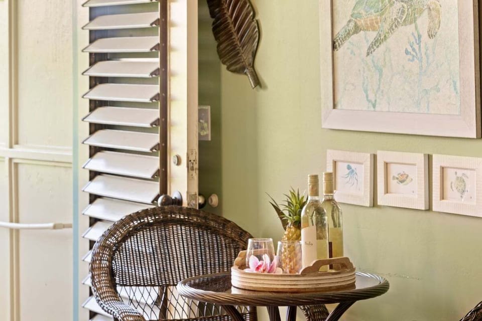 Cute table‑for‑two setup featuring bright natural light and charming coastal accents