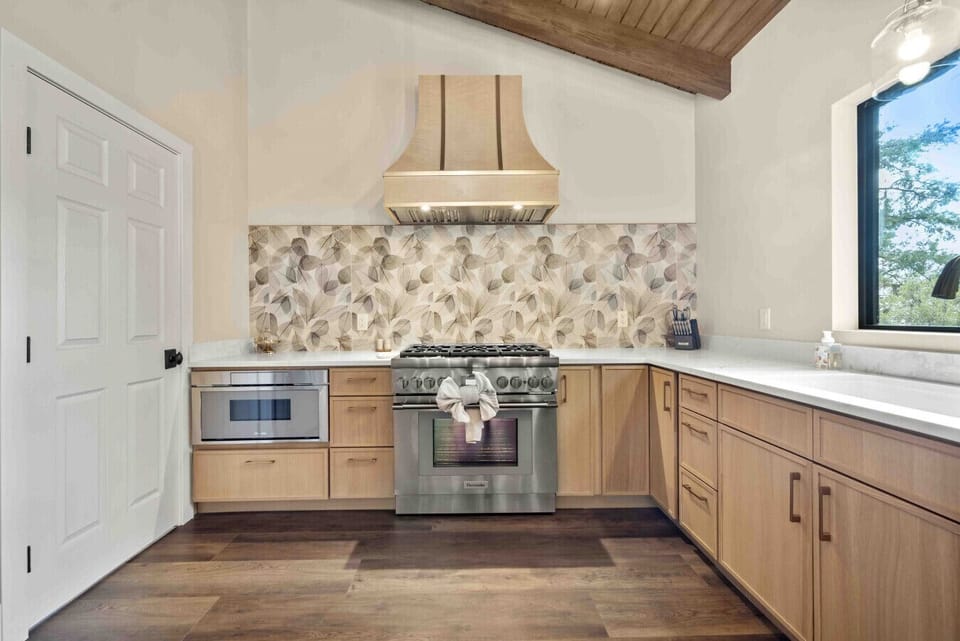 Premium natural wood cabinets and awesome stove for your culinary pleasures