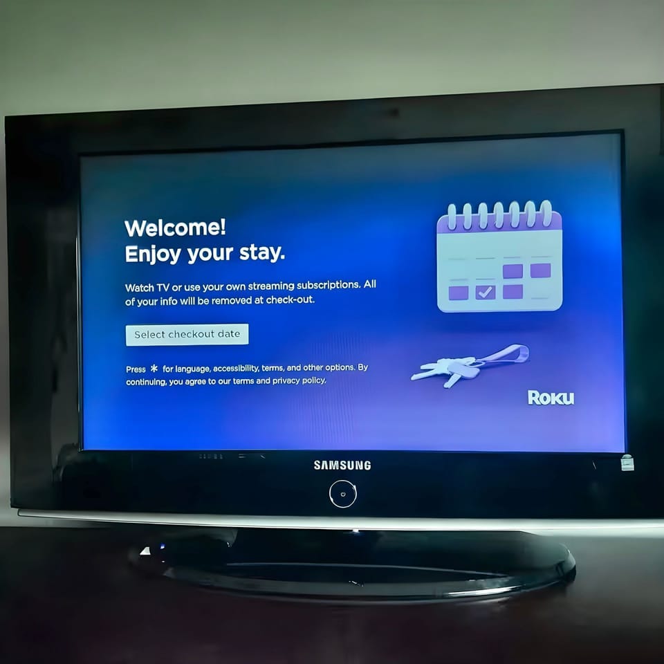 The Samsung TV in Bedroom in the master bedroom is 30-32" and has a Roku device with remote in Guest mode.