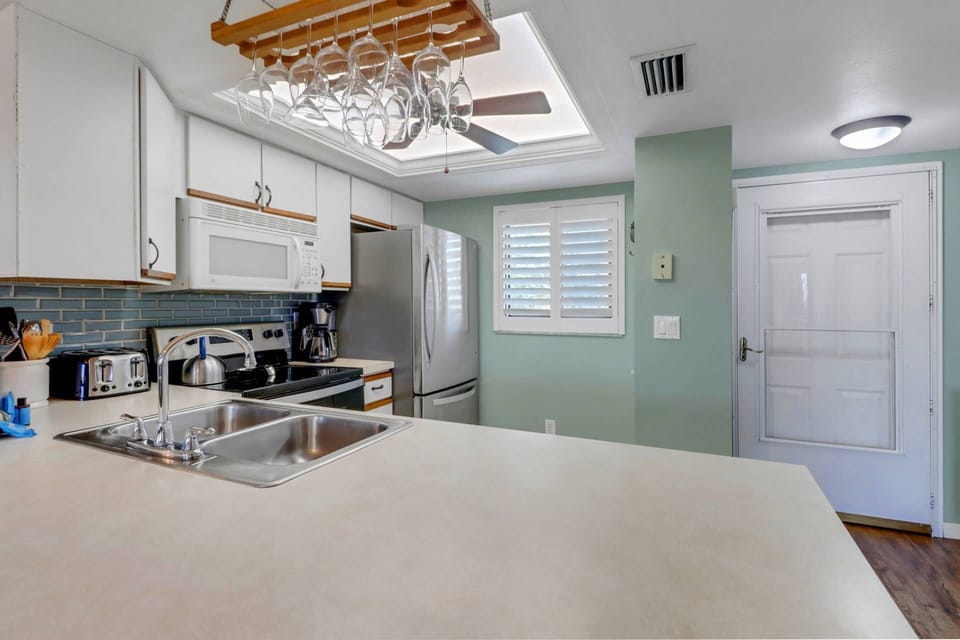 Cookware, dinnerware, many kitchen tools and small appliances are provided for your use.