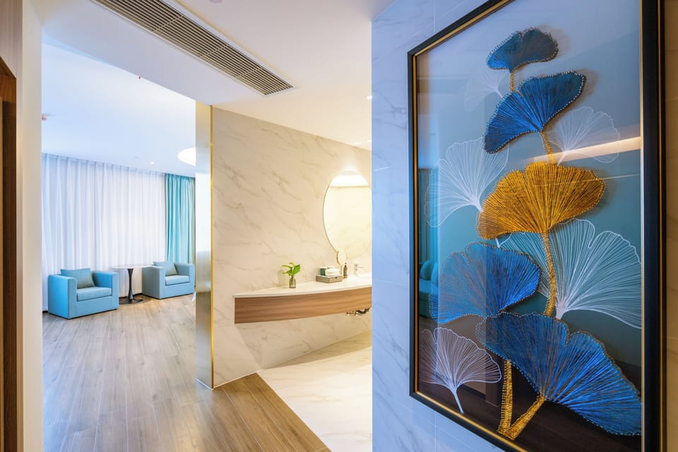 Basic Suite | Bathroom | Hair dryer, slippers, towels, soap