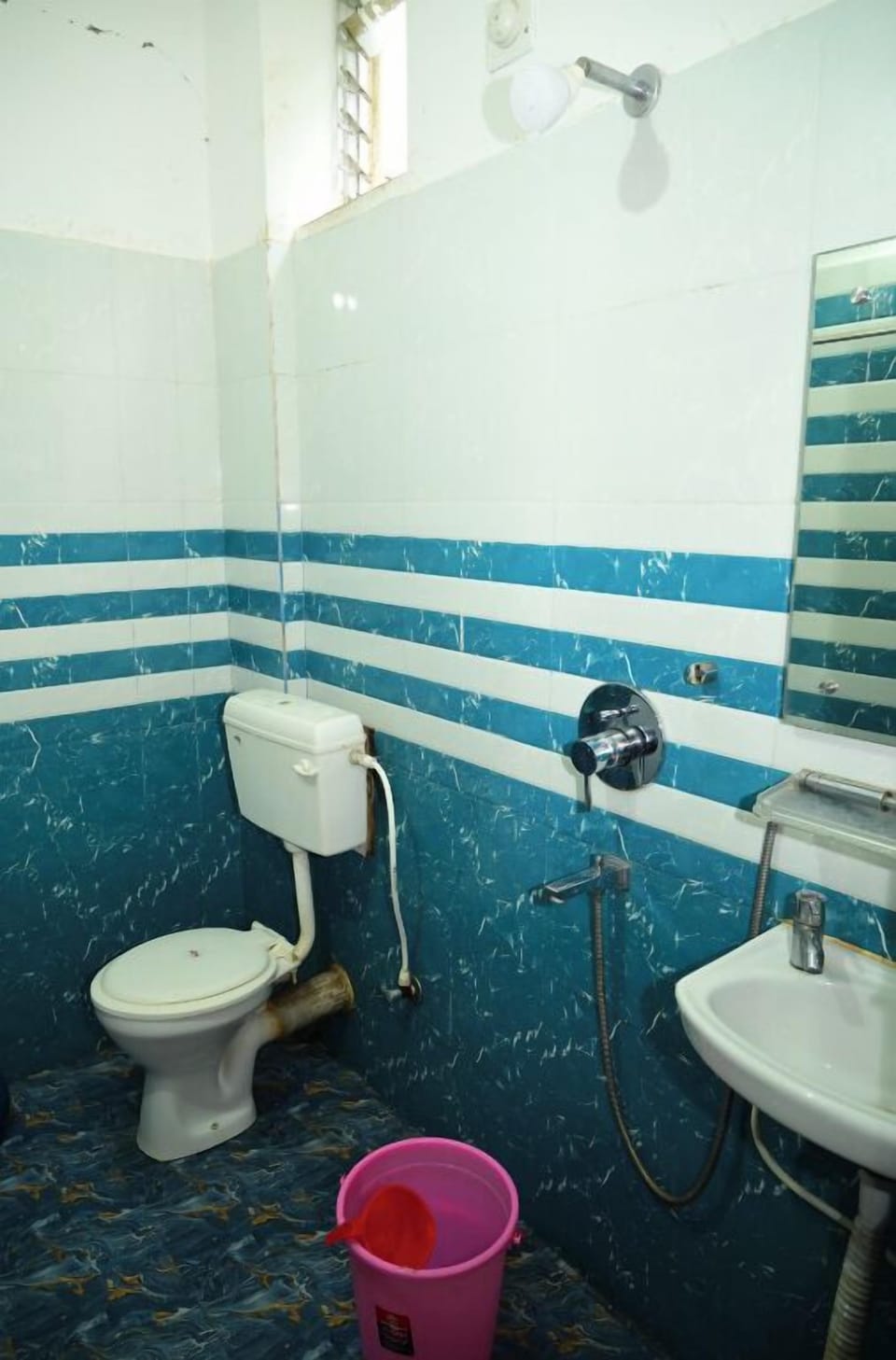 Shower, rainfall showerhead, towels, soap