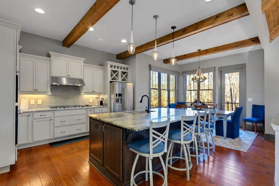 Features high-end appliances and ample cabinetry—perfect for effortless cooking and entertaining.