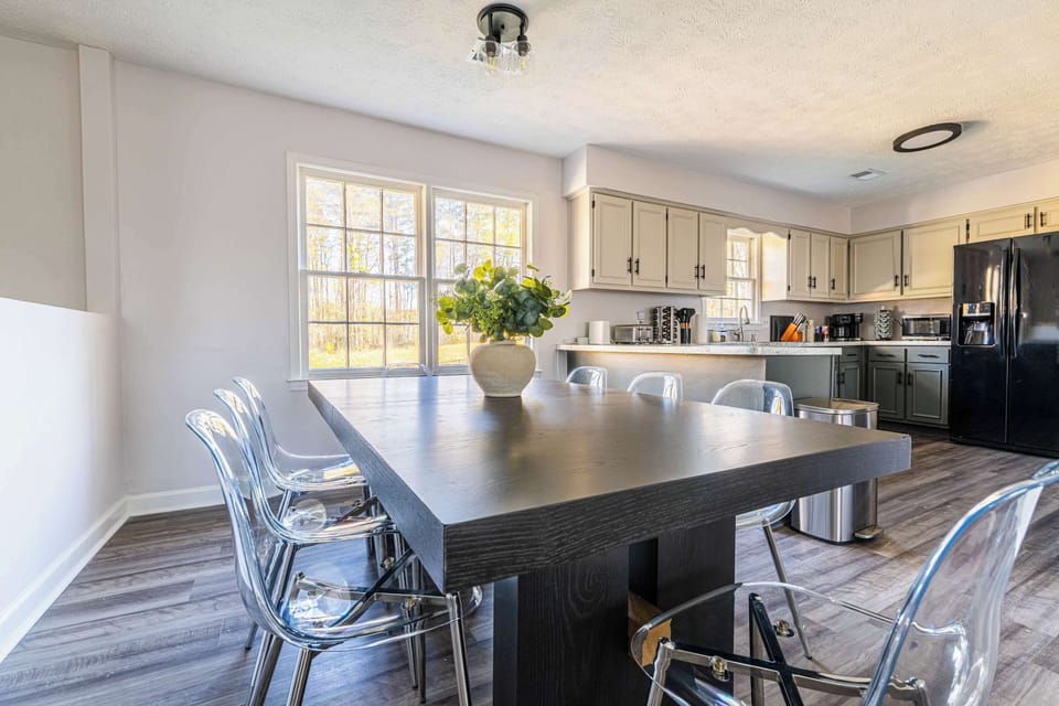 "Fully equipped kitchen with bar seating."

