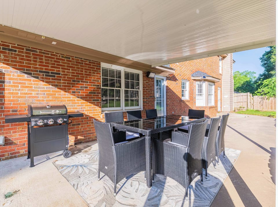 "Grill, gather, and unwind—your backyard hangout spot awaits."