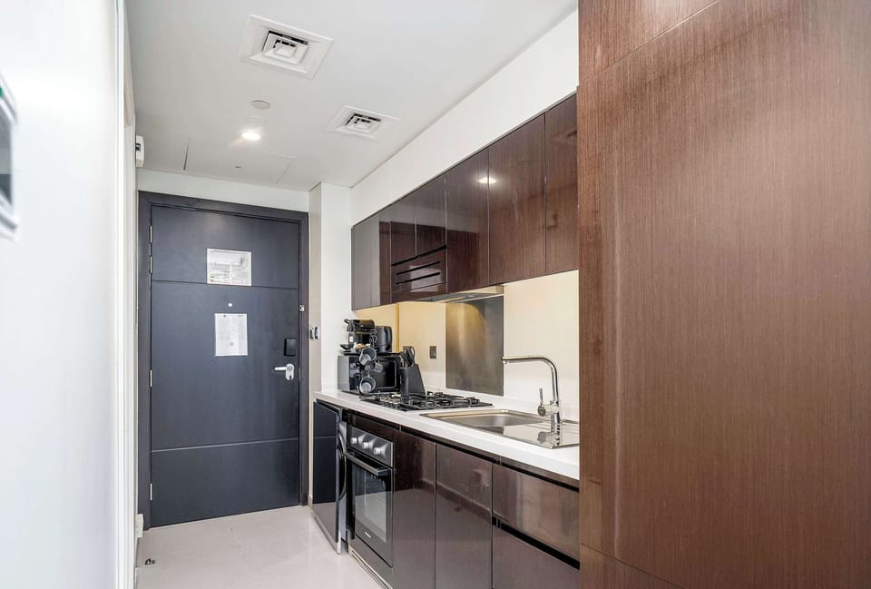 Enjoy cooking your meals in a fully equipped kitchen made for daily use offering convenience comfort and all the essentials for a relaxed and home like experience.