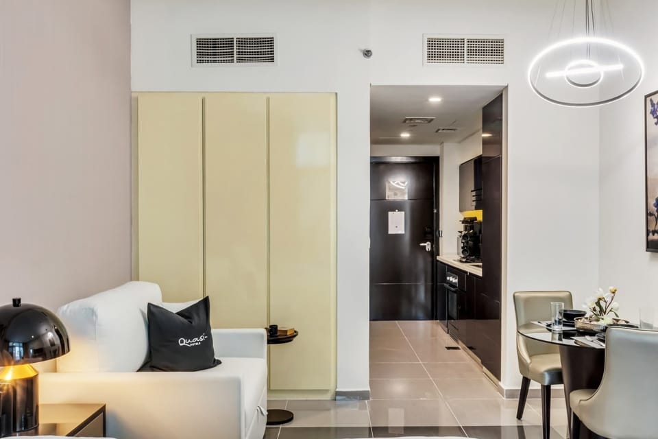 Stylish suite with cozy lounge, dining nook & sleek finishes, urban comfort redefined.