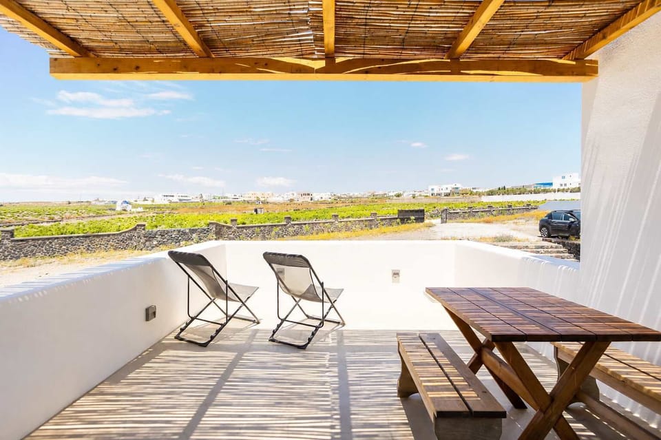 Private Terrace with Outdoor Dining and Panoramic Sea Views
