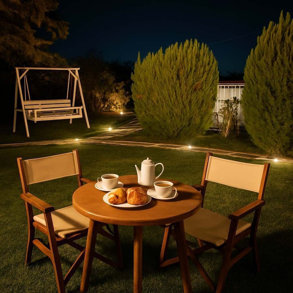 Romantic Garden Dining by Night
Soft garden lighting creates a cozy evening ambiance for outdoor meals or drinks under the stars.