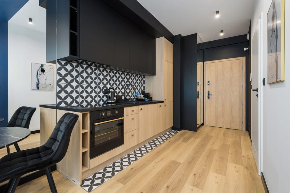 Luxury Apartment, Balcony, City View | Private kitchen | Full-size fridge, oven, stovetop, dishwasher