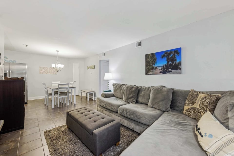 Open living space with smart TV and dining area