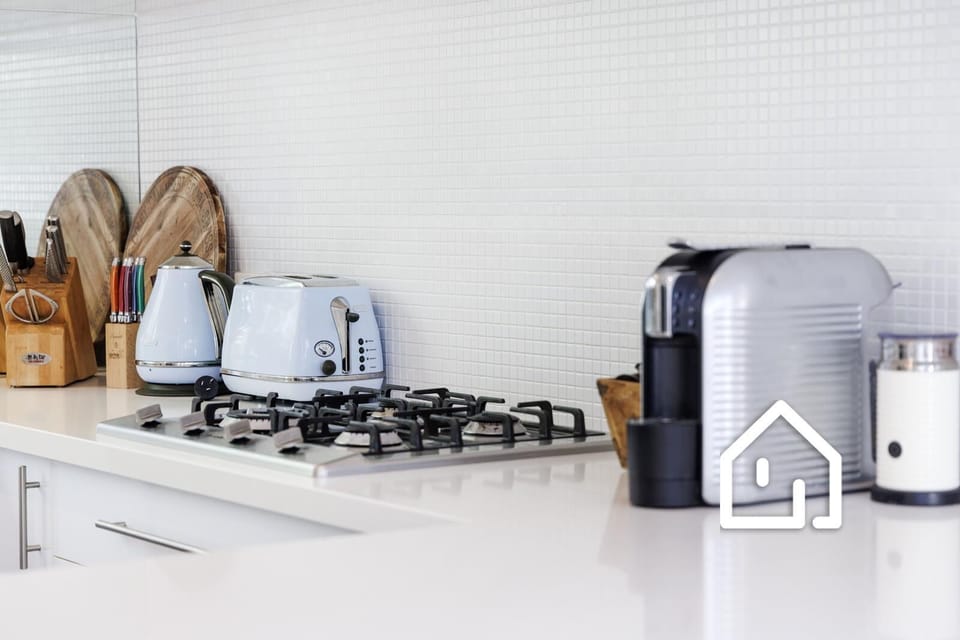 A well appointed kitchen with Aldi coffee pod machine