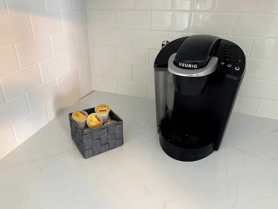 Enjoy a stocked Keurig with a selection of coffee pods, ensuring a fresh and convenient cup of coffee anytime during your stay.