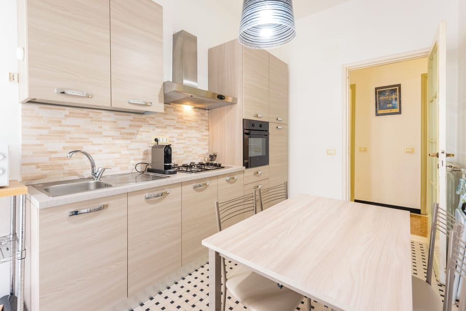 Apartment, 2 Bedrooms, Balcony | Private kitchen | Cookware/dishes/utensils, dining tables