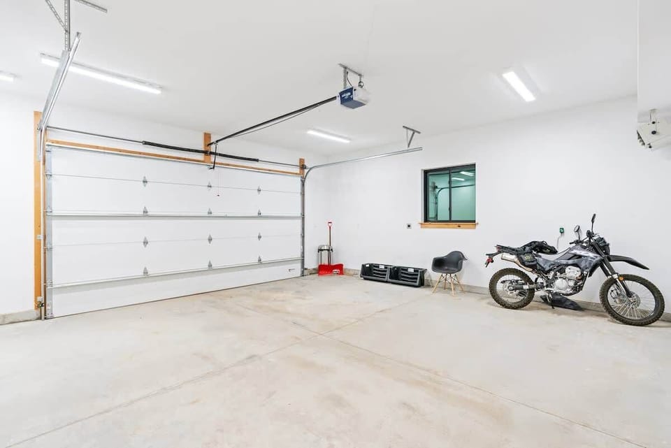 The heated garage is so nice to have during winter! There's room for one large vehicle to park comfortably. 