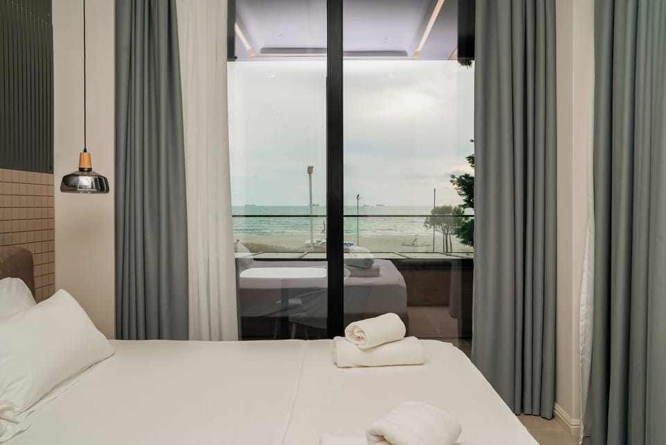 Deluxe Double Room, Balcony, Sea View | Hypo-allergenic bedding, minibar, free WiFi, bed sheets