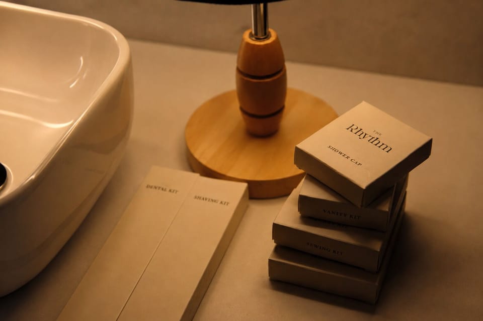 Designer toiletries, hair dryer, bathrobes, slippers