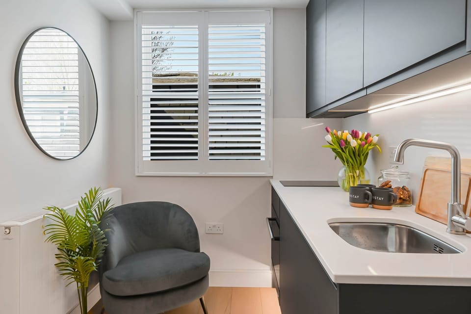 Kitchenette with window and comfy seat