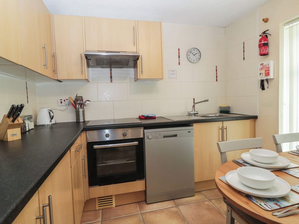 Fridge, microwave, toaster, cookware/dishes/utensils